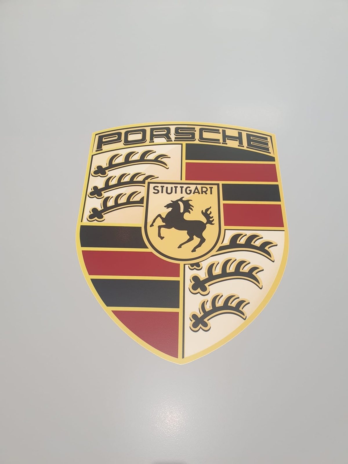 Garagevloer met Porsche-logo in de coating